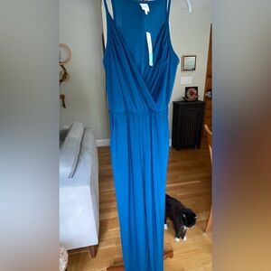 Jumpsuit dark teal color. Can be used casually or dressed up with accessories.